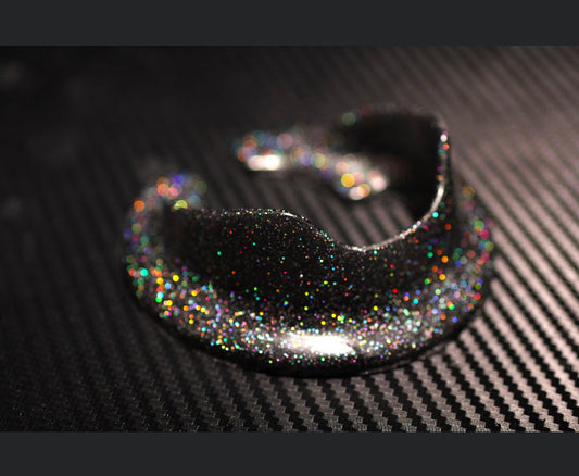 Multicolor holographic spec on black