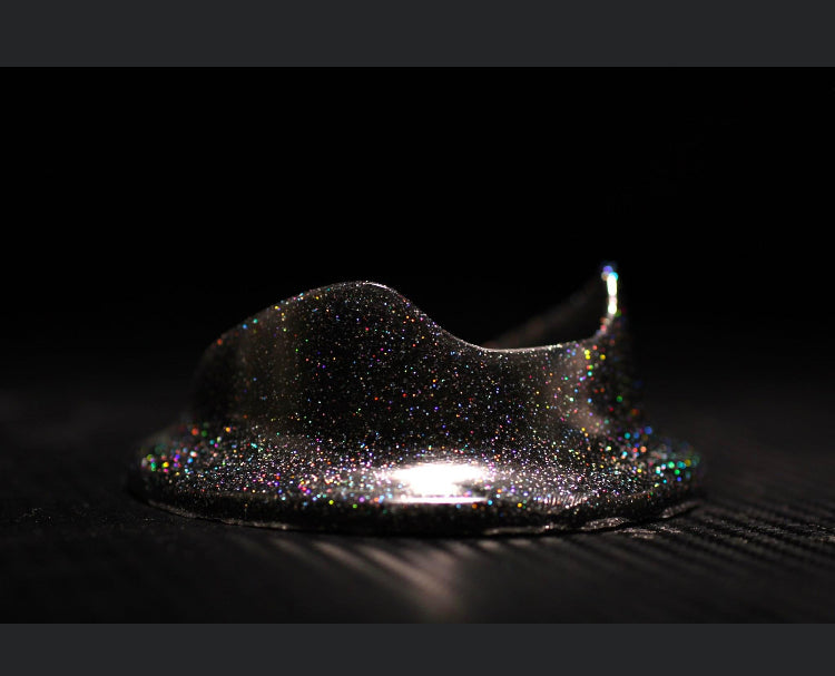 Multicolor holographic spec on black