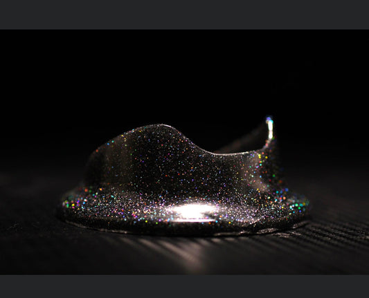 Multicolor holographic spec on black